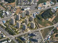 김제 검산 예다음 9개동·최고 29층·총 648세대 기준 AI 상상도(주간 항공) — 실제와 다를 수 있음