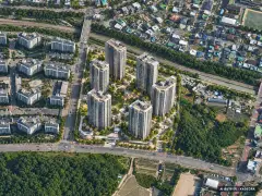 계룡 펠리피아 7개동·최고 27층·총 823세대 기준 AI 상상도 — 실제와 다를 수 있음 계룡 펠리피아 7개동·최고 27층·총 823세대 기준 AI 상상도(주간 항공) — 실제와 다를 수 있음