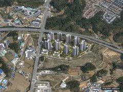 북오산자이 드포레 11개동·최고 29층·총 1,517세대 기준 AI 상상도(주간 항공) — 실제와 다를 수 있음